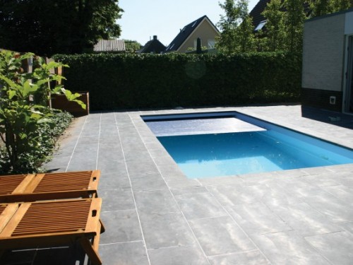 Piscina exterior sensacional rectangular com cobertura automática da piscina